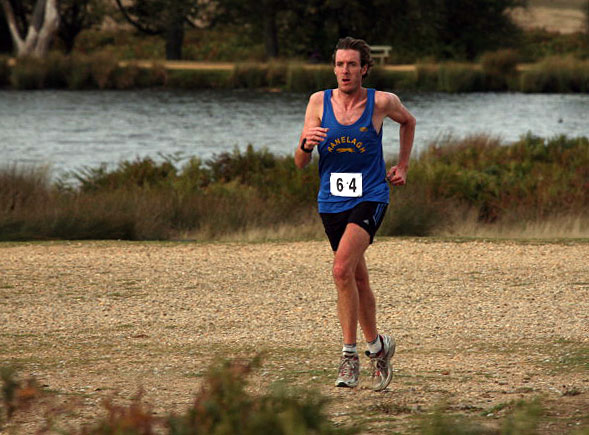 Running past the 'Pen Ponds' in Richmond Park - photo by Paul Sinton-Hewitt