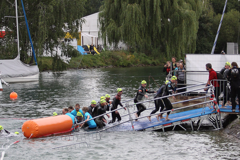 At the end of the first lap of the swim.