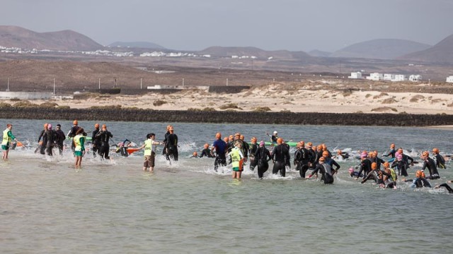'Swimmers' running across the sandbar