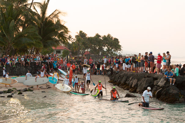 6:05am. Safety water volunteers head into the beach 25 minutes before the professional mens race start.