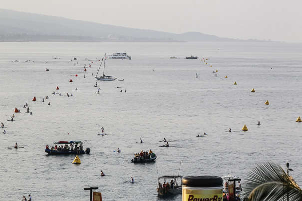 The course is swum in a clockwise direction. The turning buoys (boats) are about 1.2 miles in the distance.