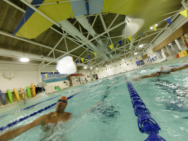 Petro (left) about to start his backstroke as Molina (right) finishes his butterfly