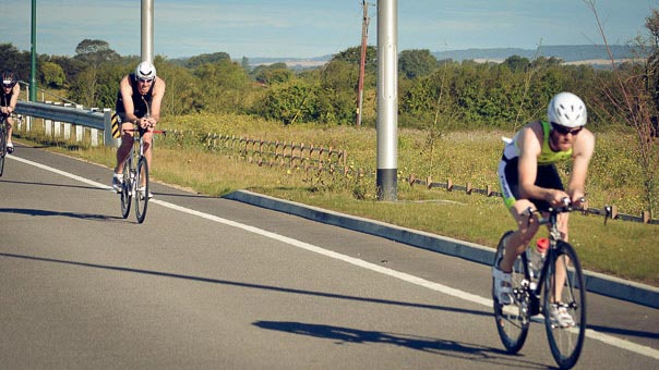 David (left) having fun on the bike. Photo: Chris Jones